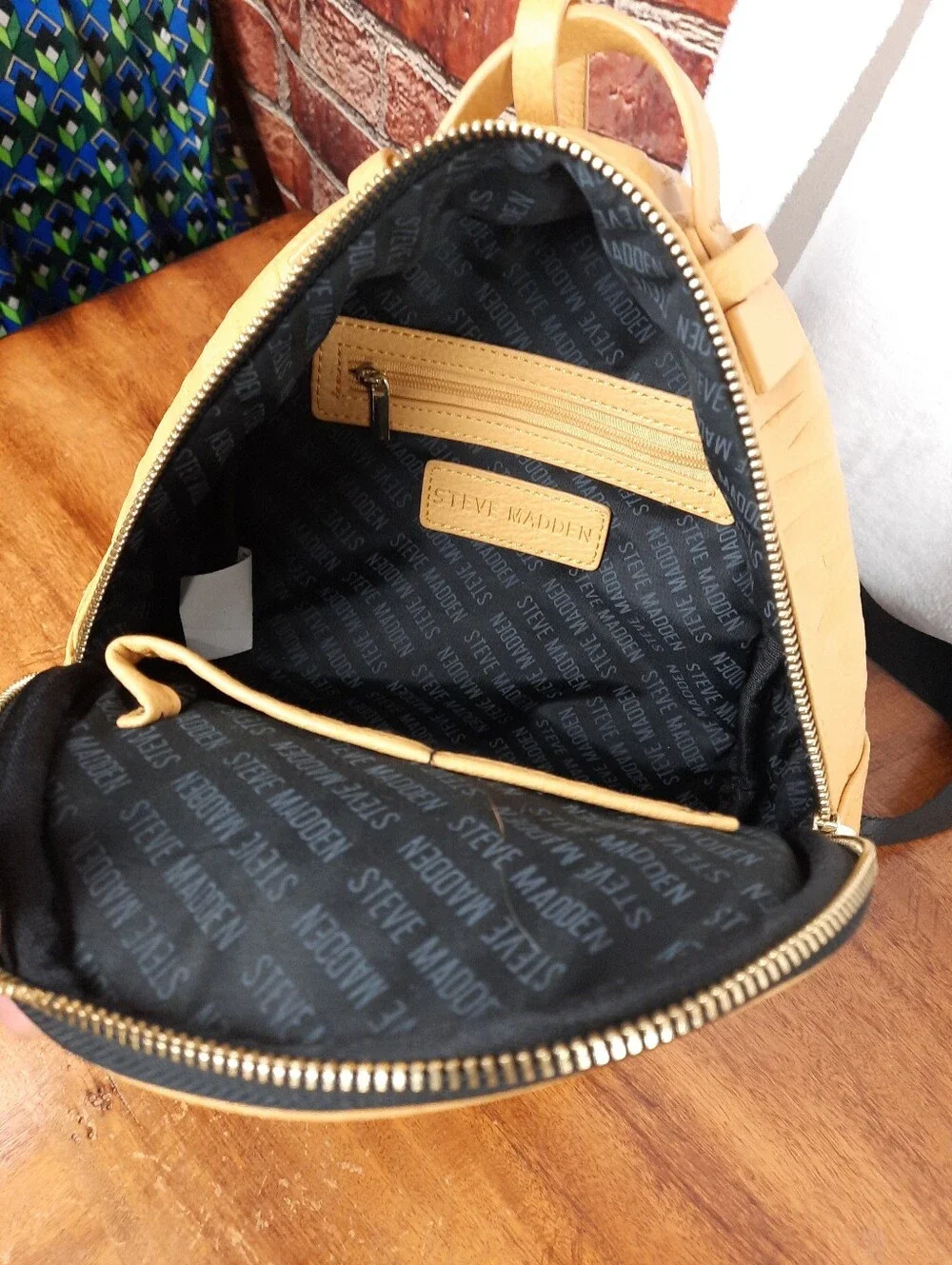 Steve Madden Mustard Mini Tassel Backpack